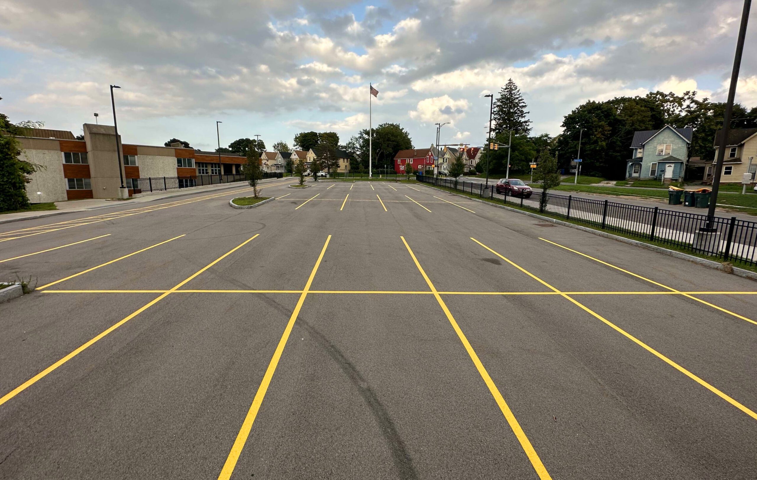 1-800-STRIPER | Parking Lot Striping in Burlington, WA Yellow parking lot line striping and painted pavement markings on fresh asphalt in Burlington, WA