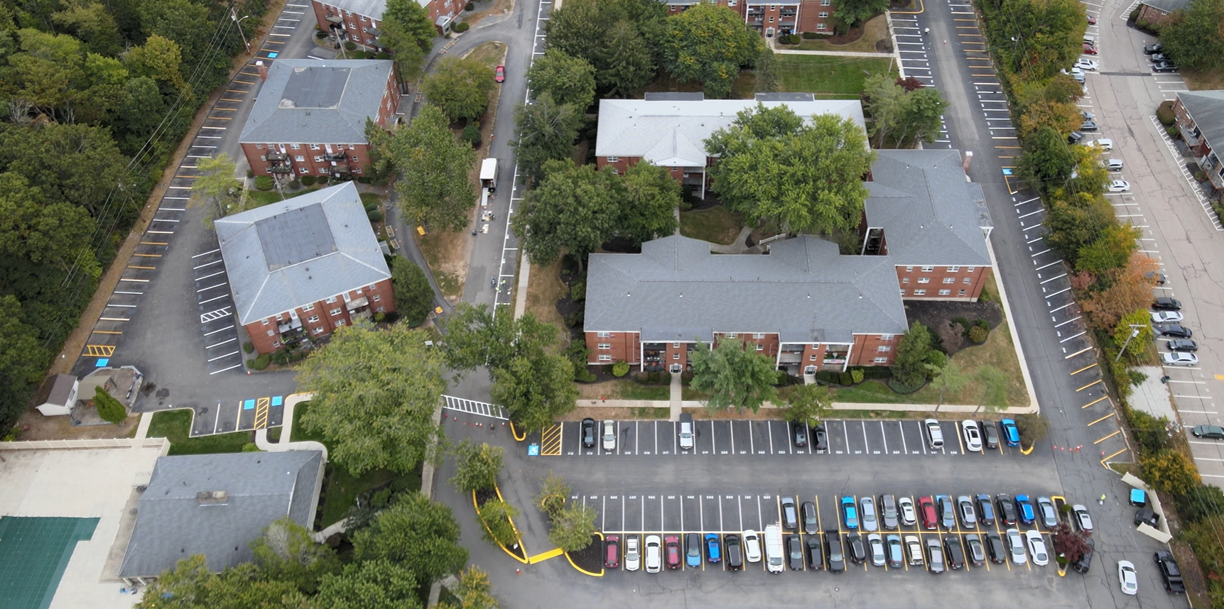 A picture of a freshly striped apartment complex